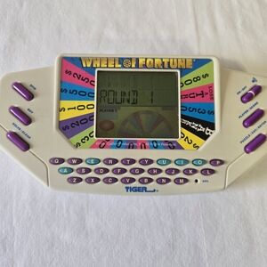 Vtg Wheel of Fortune Electronic Handheld Game - White and Purple